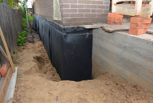SJ Waterproofing Pros technician performing targeted Crawl Space Encapsulation assessment in Walnut Grove, AL